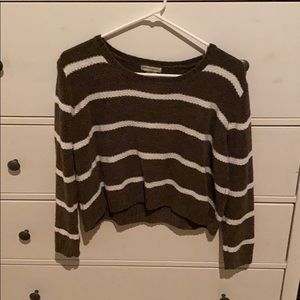 Green cropped sweater.